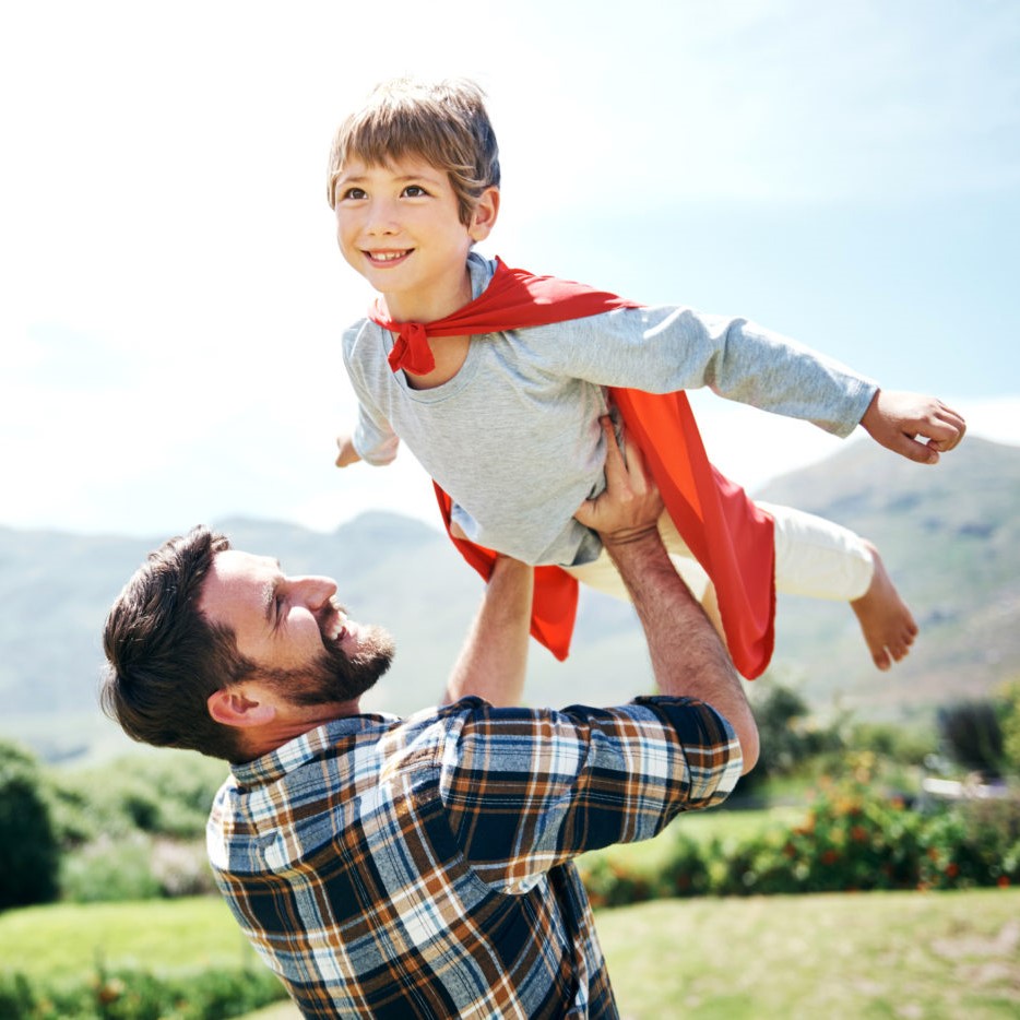 Shot of a father and his little son having fun outdoors